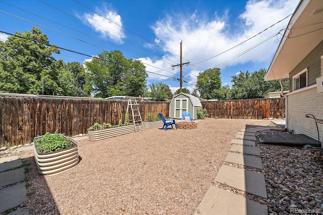 5975 Dover St, Arvada, CO 80004 - fenced backyard featuring a shed