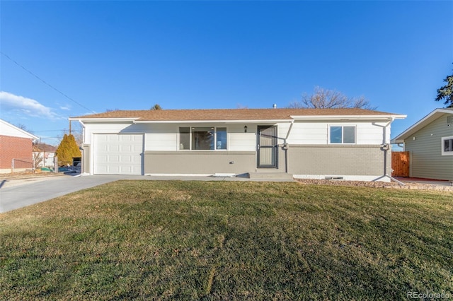 ranch-style home with a garage and a front yard