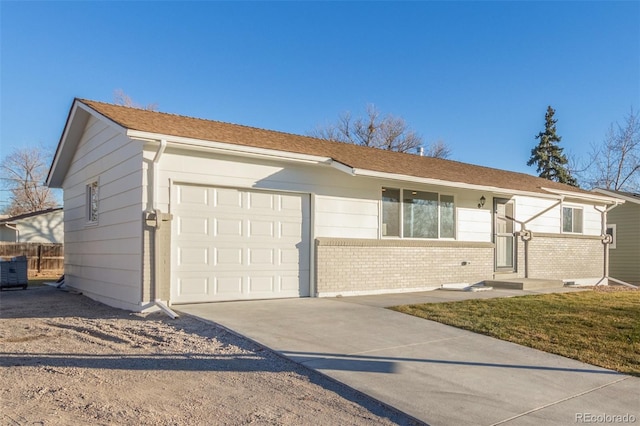 single story home featuring a garage