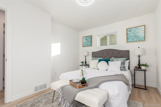 bedroom featuring light hardwood / wood-style flooring