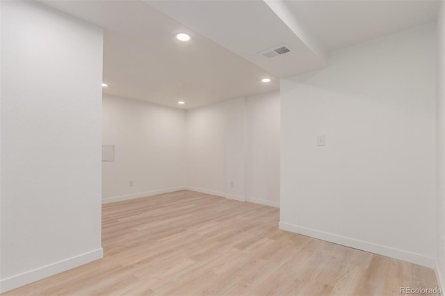 unfurnished room with light hardwood / wood-style flooring