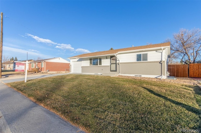 single story home featuring fence and a front yard