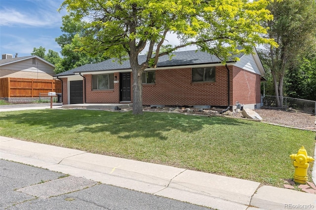 6176 Ammons St, Arvada, CO 80004 - ranch-style home with a garage, brick siding, and a shingled roof