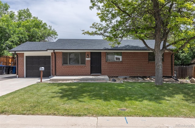 6176 Ammons St, Arvada, CO 80004 - single story home featuring a garage, driveway, brick siding, and a shingled roof