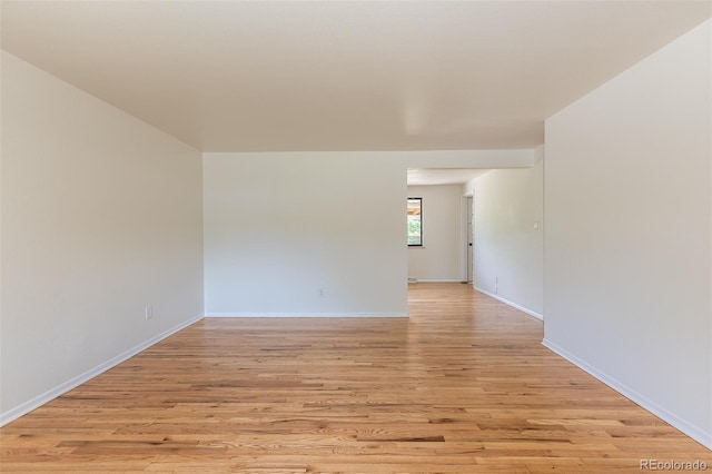 6176 Ammons St, Arvada, CO 80004 - unfurnished room with light wood-type flooring and baseboards