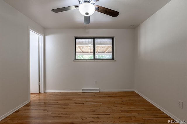 6176 Ammons St, Arvada, CO 80004 - unfurnished room with wood finished floors and ceiling fan