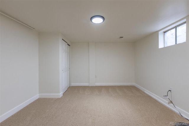 6176 Ammons St, Arvada, CO 80004 - empty room with light colored carpet and baseboards