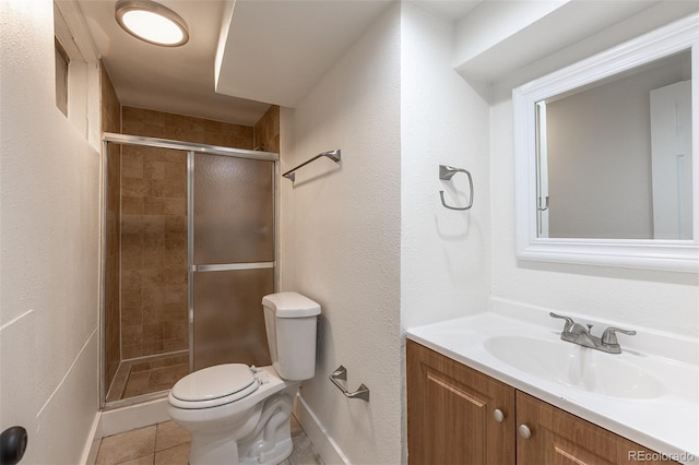 6176 Ammons St, Arvada, CO 80004 - full bath with vanity, a stall shower, and tile patterned floors