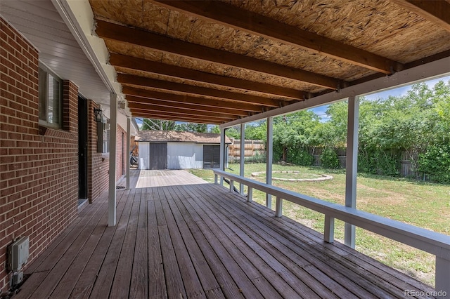 6176 Ammons St, Arvada, CO 80004 - deck with a shed and a fenced backyard