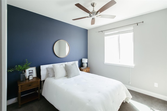 carpeted bedroom with ceiling fan