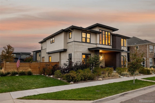 view of front of home featuring a yard