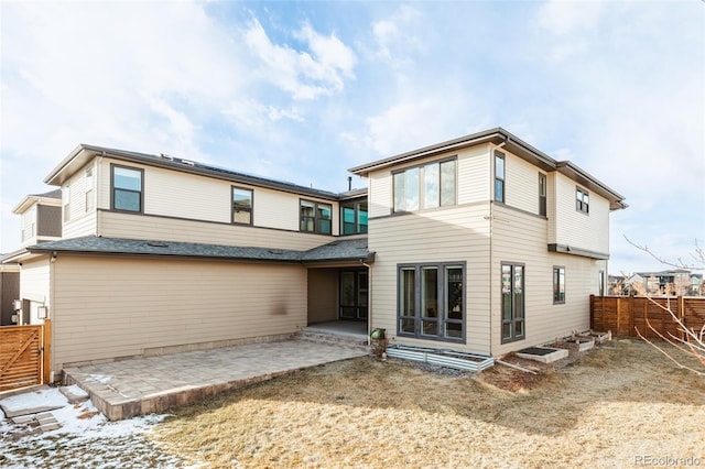 rear view of property with a patio area