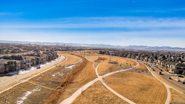 drone / aerial view featuring a mountain view