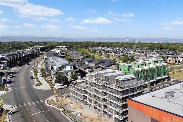 birds eye view of property featuring a mountain view