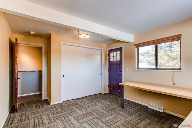 view of carpeted entryway