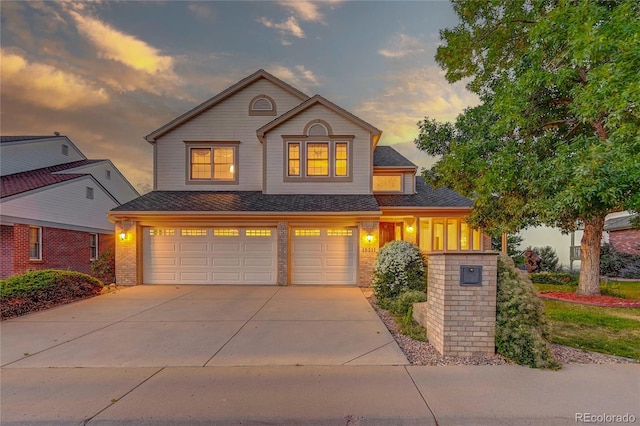 view of front of property featuring a garage