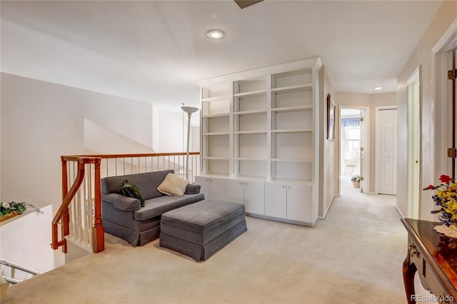 living room featuring light colored carpet