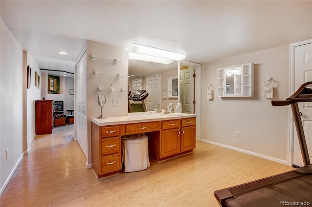 bathroom featuring vanity and wood-type flooring