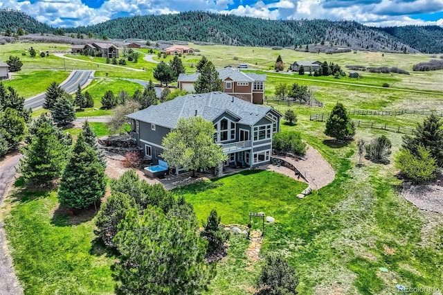 view of subject property featuring mountains