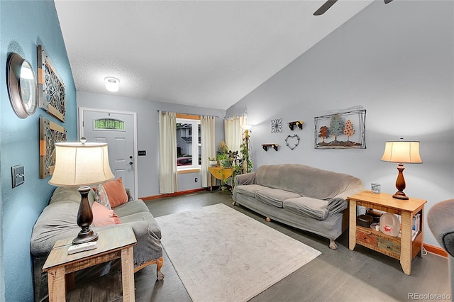 5323 E Sandpiper Ave, Castle Rock, CO 80104 - living room featuring wood finished floors, vaulted ceiling, baseboards, and ceiling fan