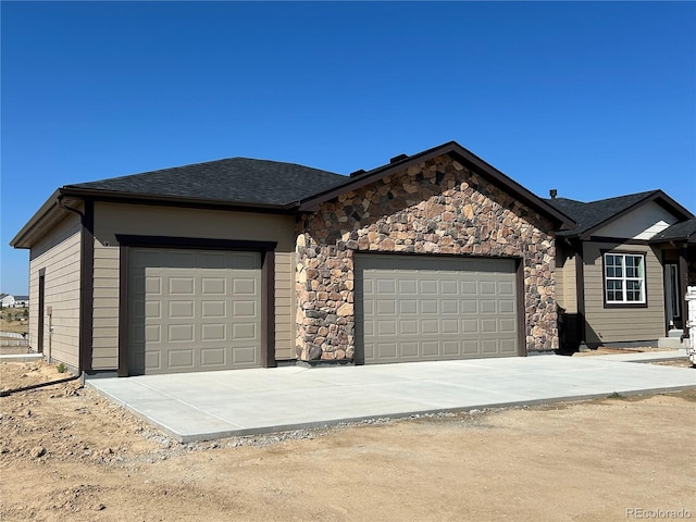 ranch-style home with a garage