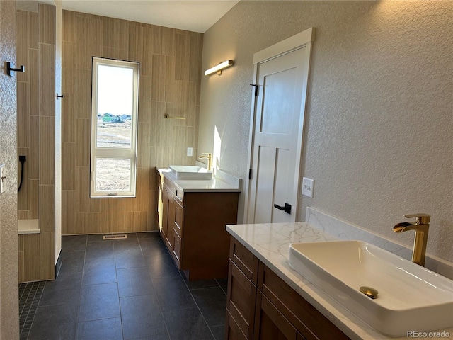 bathroom with vanity and tile patterned floors