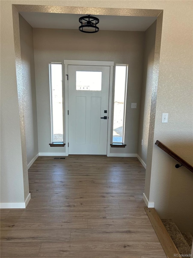 entrance foyer featuring light hardwood / wood-style floors