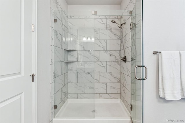 full bathroom with a shower stall