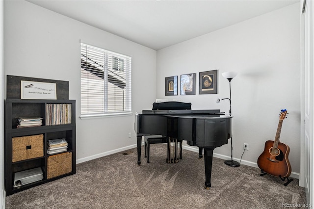 sitting room with carpet, visible vents, and baseboards