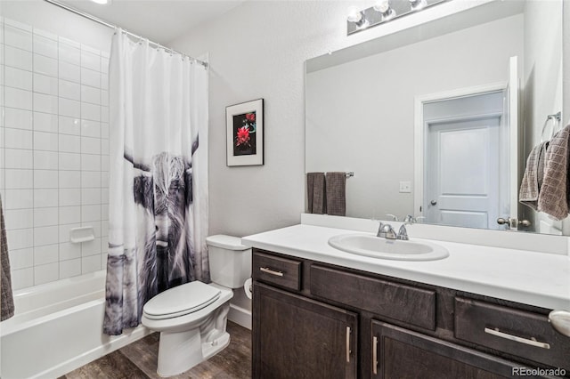 bathroom with vanity, toilet, shower / bathtub combination with curtain, and wood finished floors
