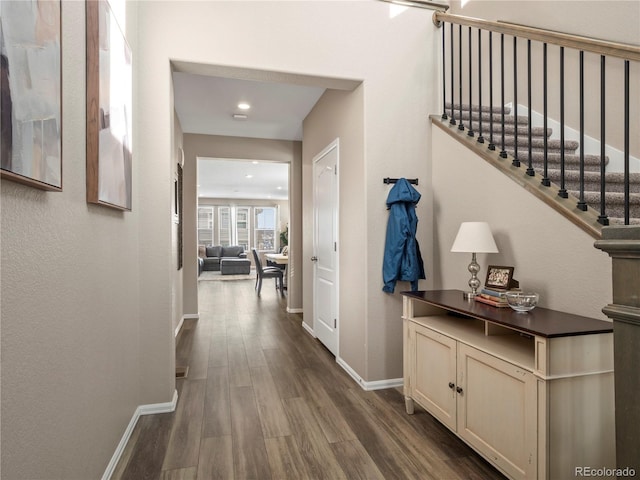 hallway with wood-type flooring