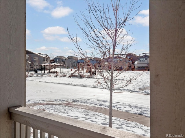 view of yard covered in snow