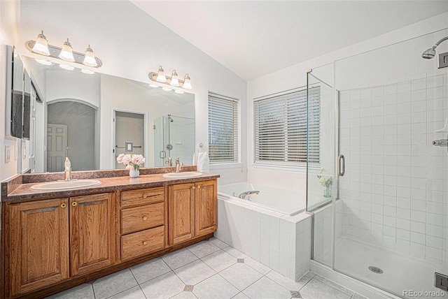 5607 S Gray St, Littleton, CO 80123 - bathroom with tile patterned flooring, a sink, a bath, and a stall shower