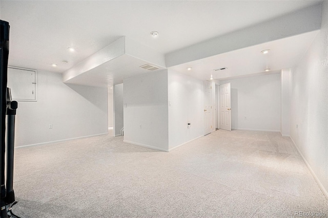 5607 S Gray St, Littleton, CO 80123 - finished basement with baseboards, visible vents, recessed lighting, and light colored carpet