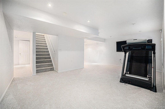 5607 S Gray St, Littleton, CO 80123 - unfurnished living room with stairs, baseboards, and carpet