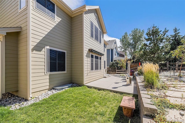 view of home's exterior featuring a patio