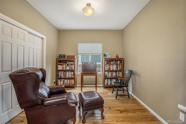 11973 Song Bird Hills St, Parker, CO 80138 - living area featuring light wood-style floors and baseboards