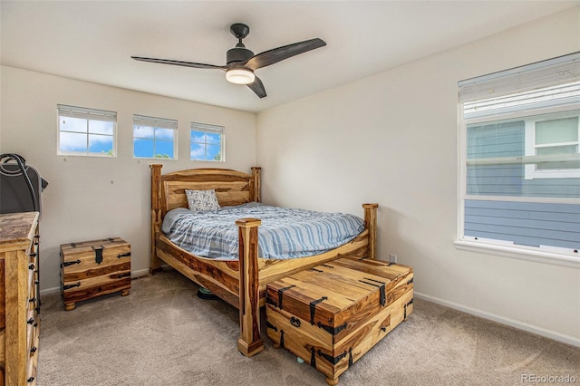 11973 Song Bird Hills St, Parker, CO 80138 - bedroom featuring light carpet and a ceiling fan