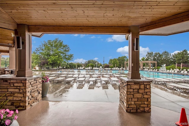 11973 Song Bird Hills St, Parker, CO 80138 - view of patio / terrace with a community pool
