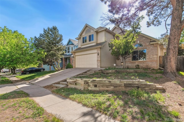 6980 Native Cir, Colorado Springs, CO 80919 - traditional-style house featuring brick siding, driveway, and a garage