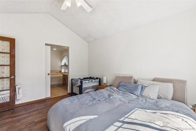 6980 Native Cir, Colorado Springs, CO 80919 - bedroom with wood finished floors, vaulted ceiling, a textured ceiling, a ceiling fan, and baseboards