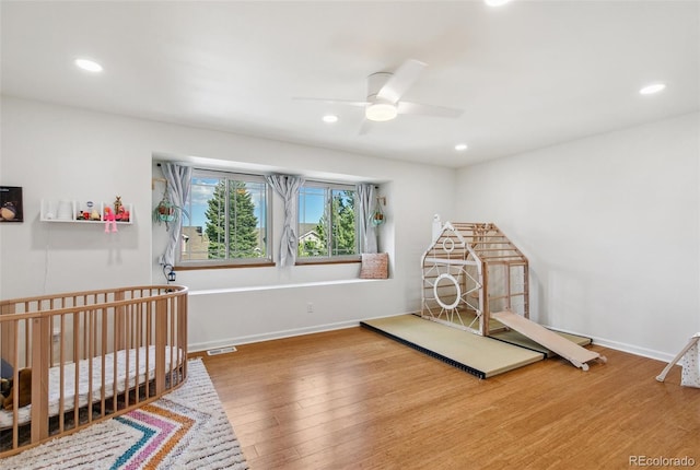 6980 Native Cir, Colorado Springs, CO 80919 - bedroom featuring wood finished floors, recessed lighting, baseboards, and a ceiling fan