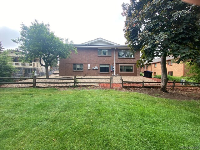 7079 Estes Dr, Arvada, CO 80004 - rear view of house with brick siding