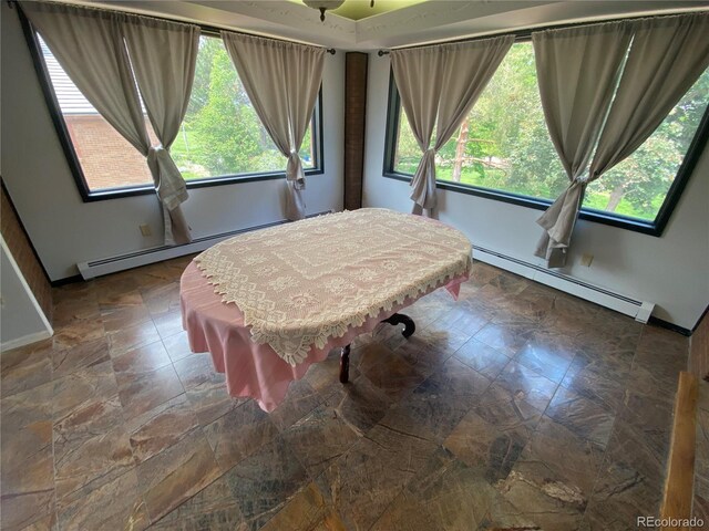 7079 Estes Dr, Arvada, CO 80004 - dining area featuring baseboard heating, billiards table, and baseboards