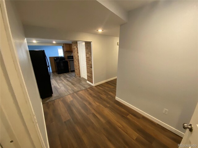 7079 Estes Dr, Arvada, CO 80004 - corridor with baseboards, dark wood-style flooring, and recessed lighting