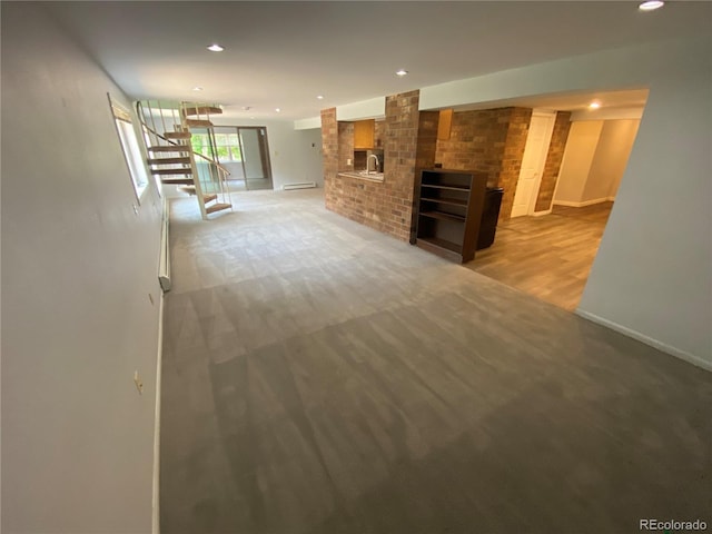 7079 Estes Dr, Arvada, CO 80004 - unfurnished living room featuring baseboards, light colored carpet, recessed lighting, and a fireplace
