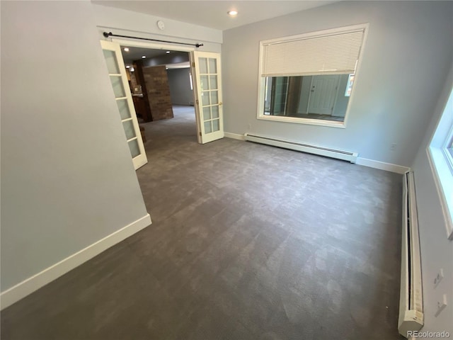 7079 Estes Dr, Arvada, CO 80004 - empty room with baseboard heating, carpet floors, baseboards, and recessed lighting