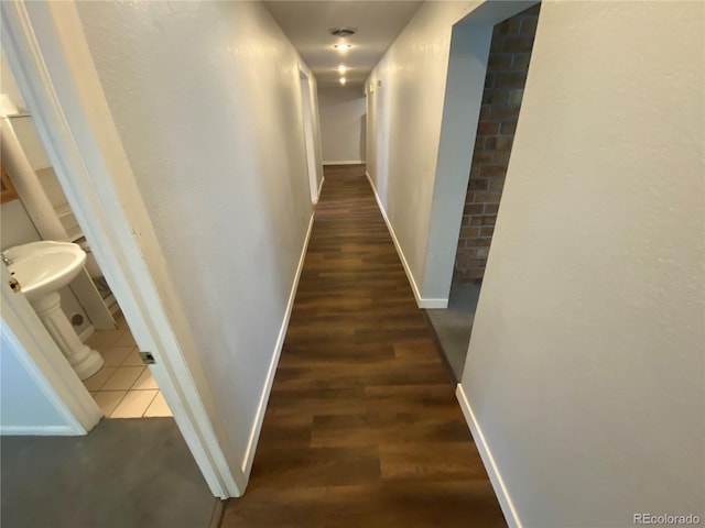7079 Estes Dr, Arvada, CO 80004 - hallway with wood finished floors and baseboards