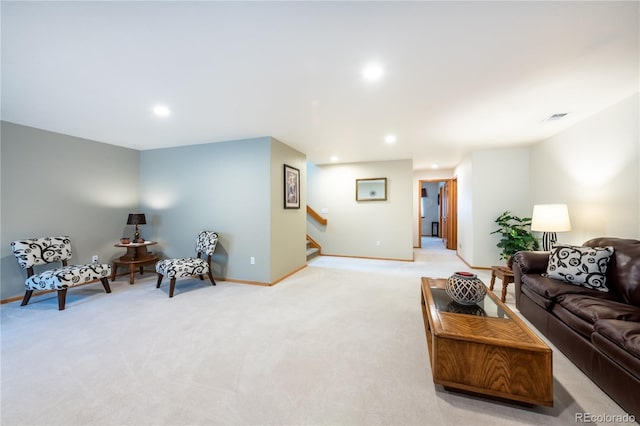 living room featuring light carpet