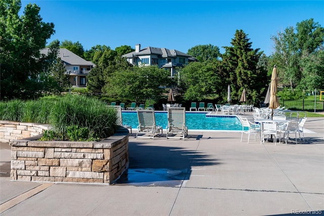 view of pool with a patio